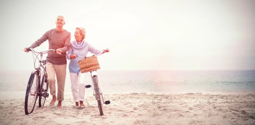 refractive lens exchange, clear lens extraction, older couple on beach